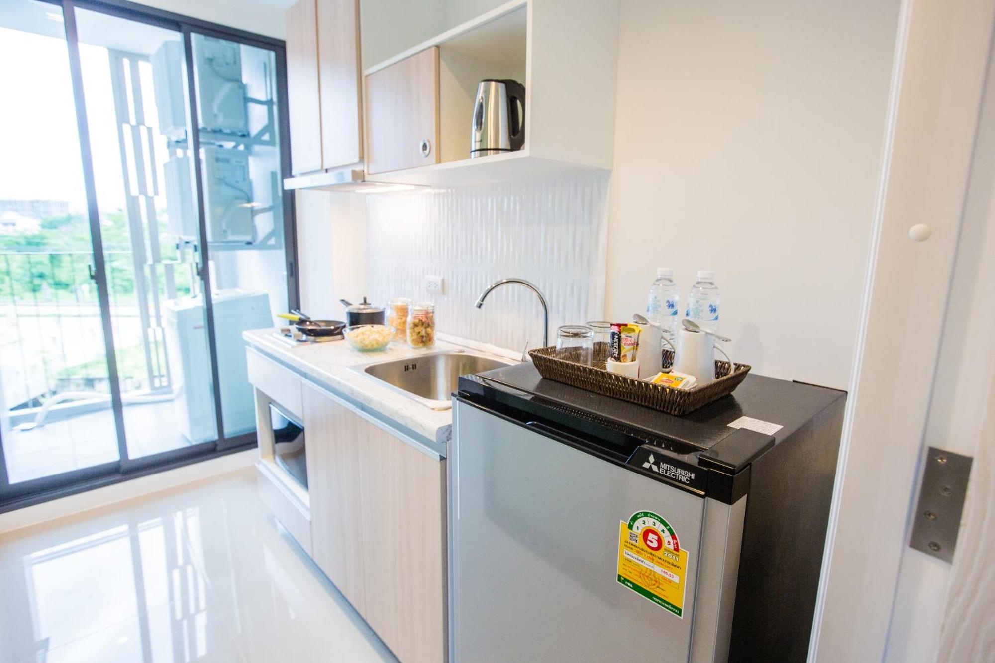 Connext Residence Phuket Habitación foto